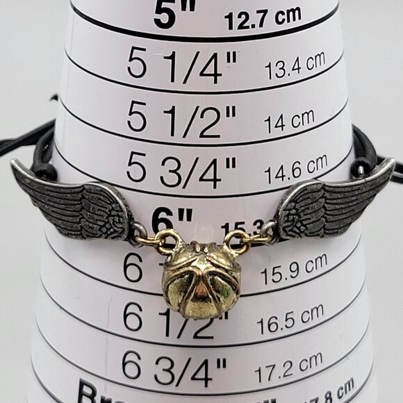Harry Potter Golden Snitch Winged Bracelet Warner Bros Adjustable Black Cord - Picture 5 of 6